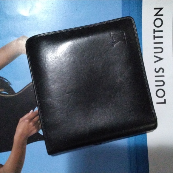 LOUIS VUITTON: "2005"; PORTEFEUILLE MARCO BIFOLD NOMADE LEATHER WALLET, #AR0065. - Picture 1 of 12